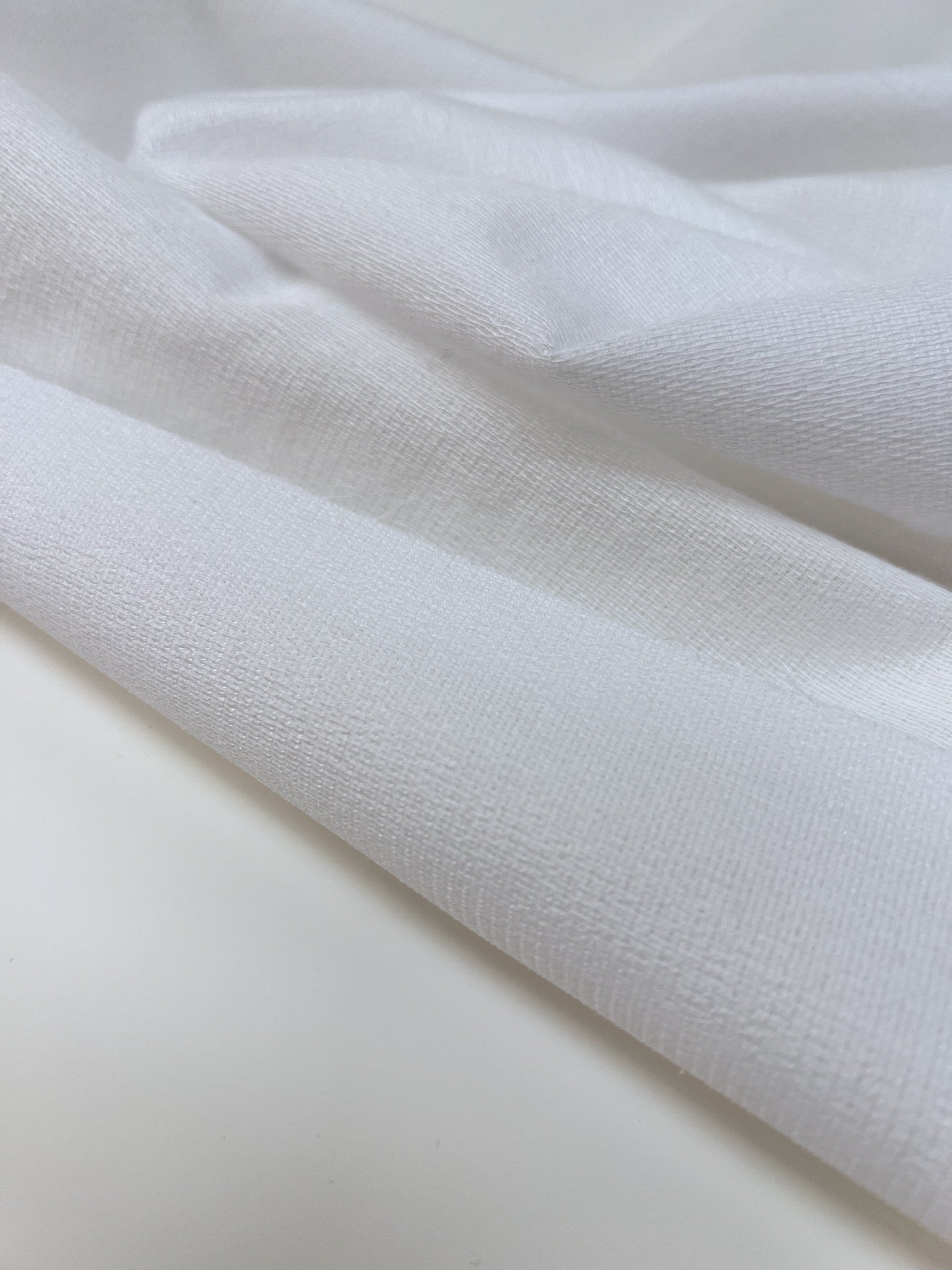 Entoilage polyester nuances de blanc
