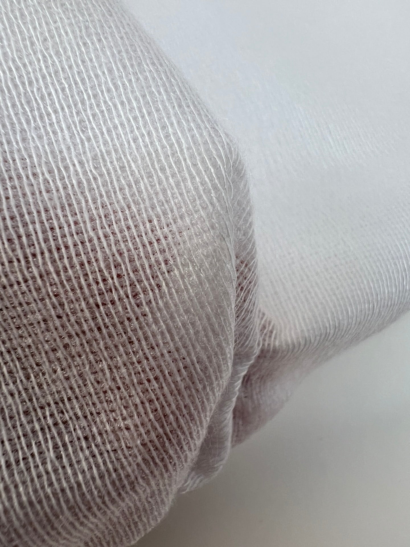 Entoilage polyester nuances de blanc